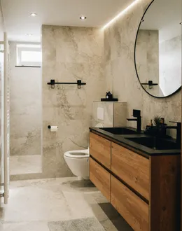 a bathroom with a large mirror