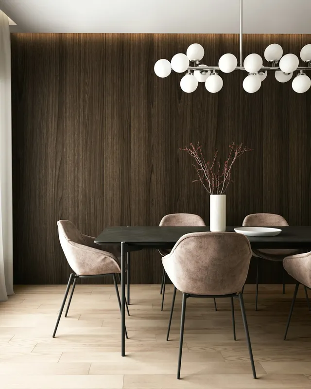 a room with a table chairs and a plant with lights
