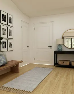a hallway with a large mirror and a chandelier — detail 1