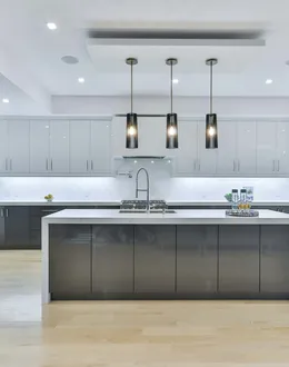 white and brown kitchen cabinet — detail 1