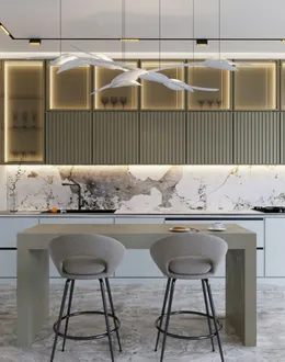 a modern kitchen with marble counter tops and stools