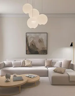 gray padded chaise couch beside window — detail 2