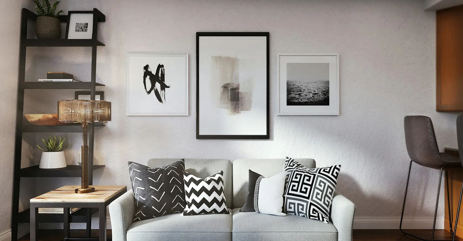 white and black throw pillow on white couch