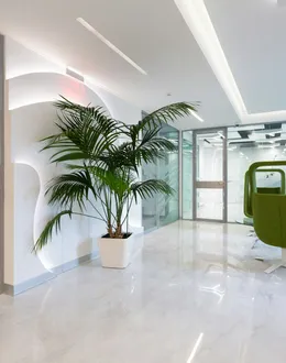 a reception desk with a laptop on top of it — detail 2